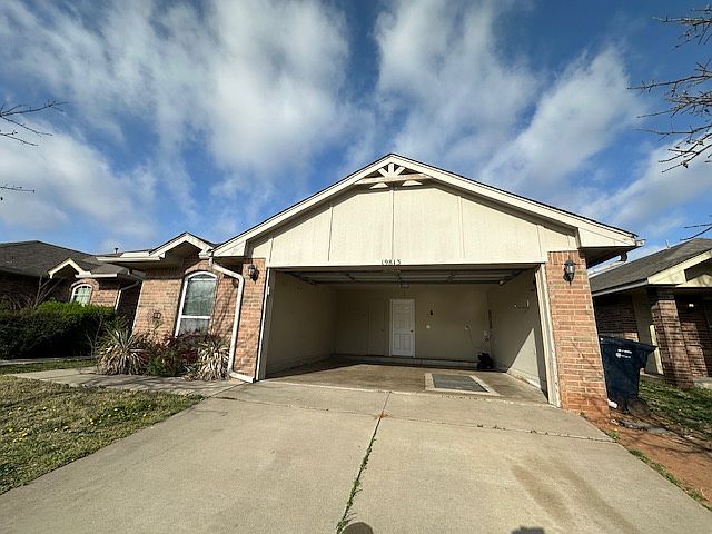 2-car garage with 8-10 people in-ground storm shelter