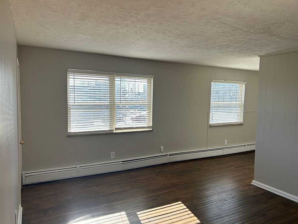 Warm Oak Floors Welcome Guests Upon Entering