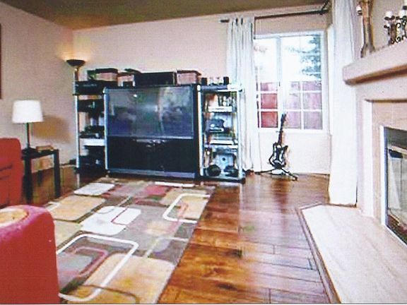 Open concept family room with fireplace