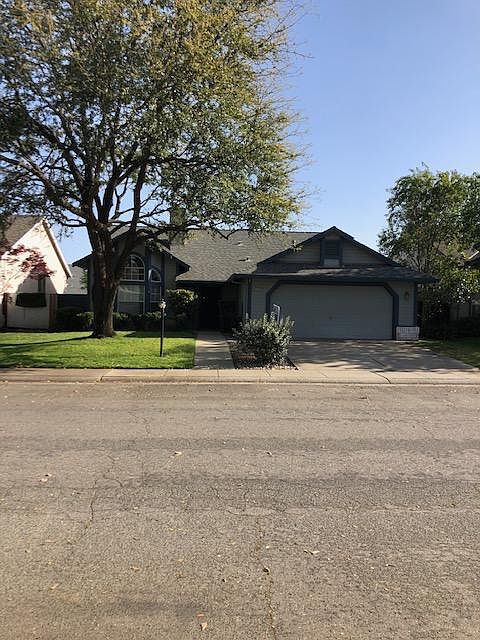 Located on a quiet interior street.. Front view of the home.