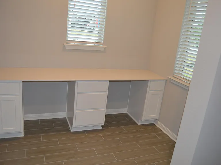 Office Room with Built-in Desks and Drawers