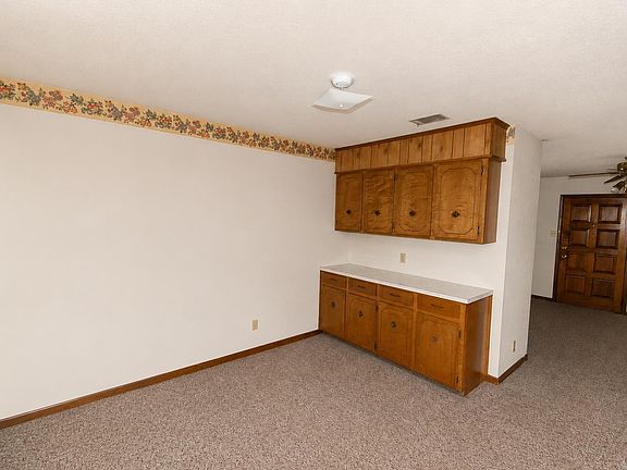 5th image of 6102 Woodview Dr N