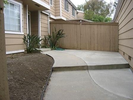 Private yard entry offers direct garage access 