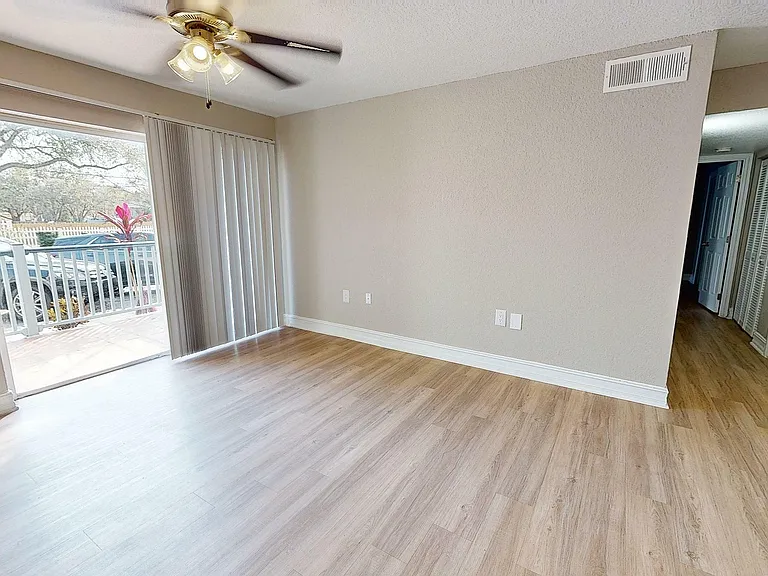Step into your new living space filled with natural light and modern elegance.