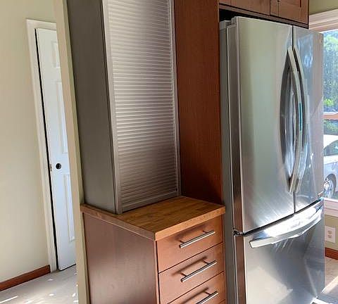 New fridge and roll up cabinet. Soft close drawers.