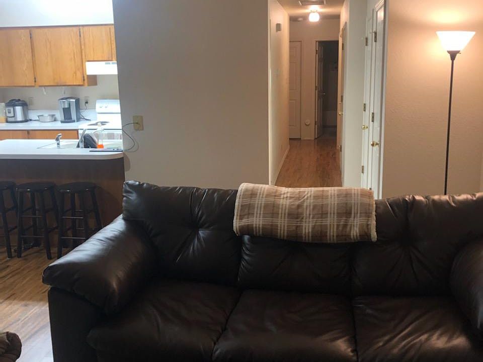 Living Area + Kitchen and Hallway to bedrooms and bathroom