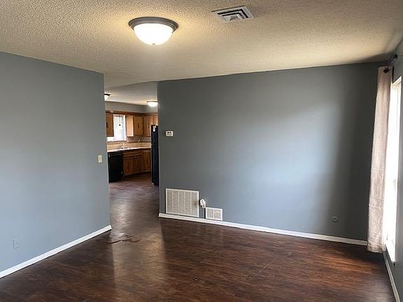 Living room with view to Kitchen