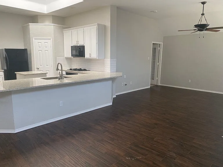 Open concept kitchen and living space.