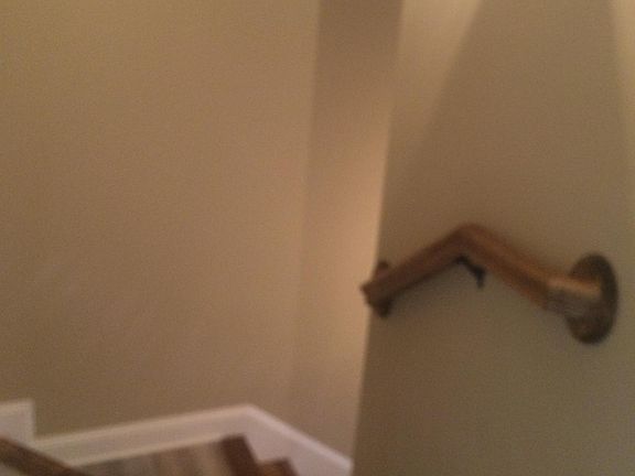 Top of stairs to midway down.