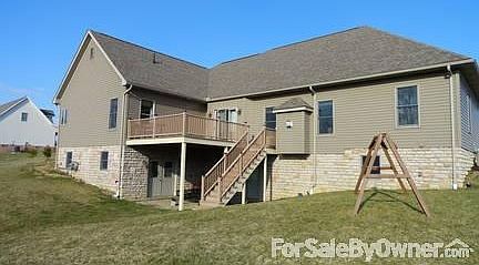 Back of house,deck,walk-out
						:
						back yard view w/ deck,walk-out basement