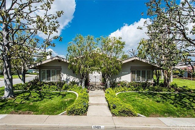 Custom-built home with dramatic front entry.