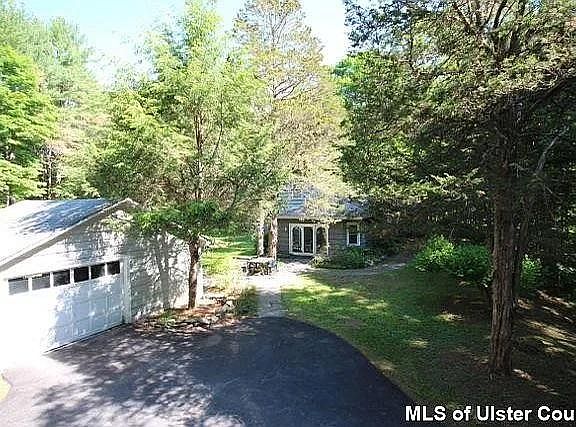 1 car garage with storage for skis, bikes, lawn equipment