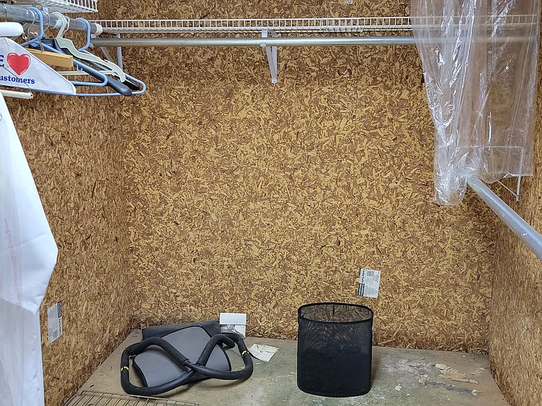 Cedar lined clothes storage closet in basement