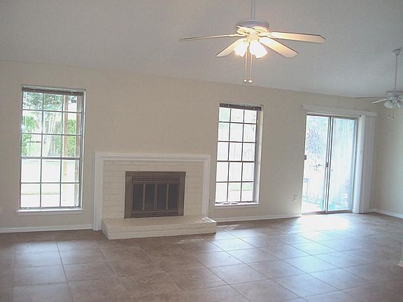 This home features beautiful ceramic tile throughout the house.  It is very open to the breakfast area & kitchen.