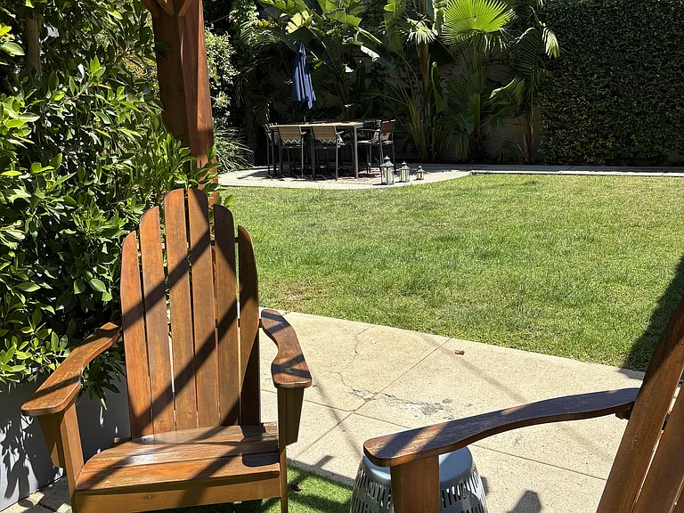 Backyard pergola and large outdoor table