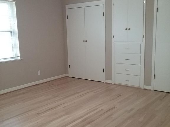 Master bedroom with double closets and built in drawers and cabinet 15 x 13
