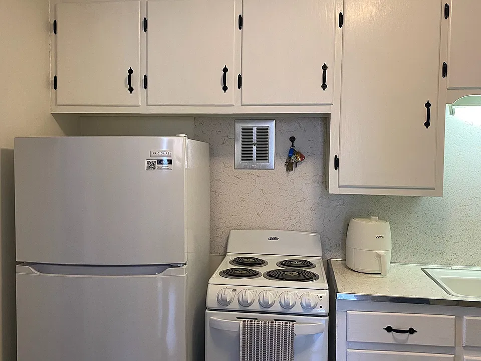New appliances in kitchen and freshly painted