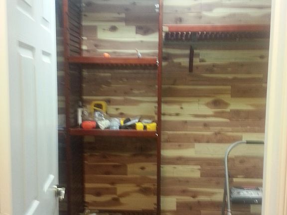 His and her closets set up the same. Cedar lined closets wit