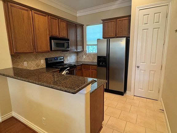 4th image of 9007 Harbor Hills Dr
