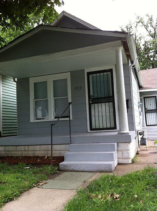 Large Front Porch Shaded By 2 Large Mature Trees