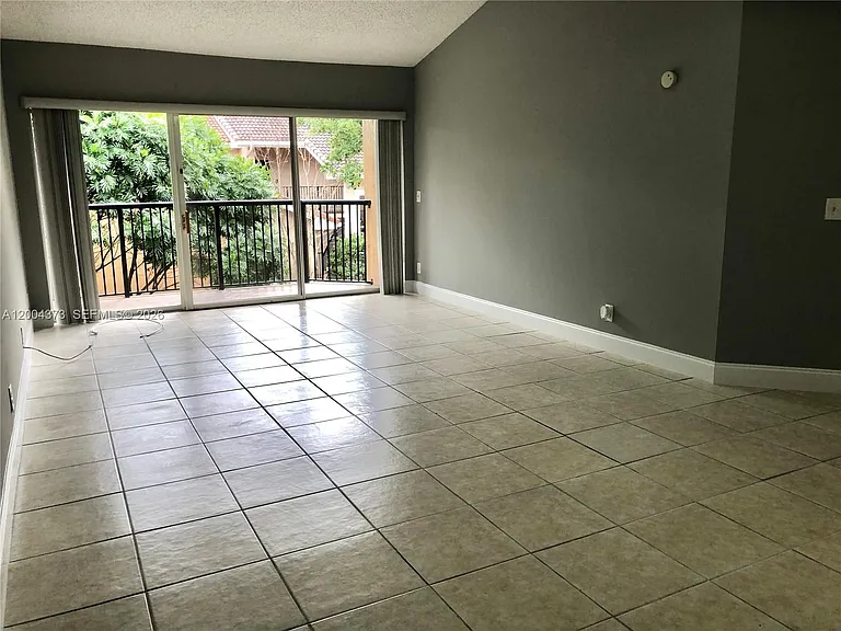 8761 Wiles Rd #306 — Photo 9