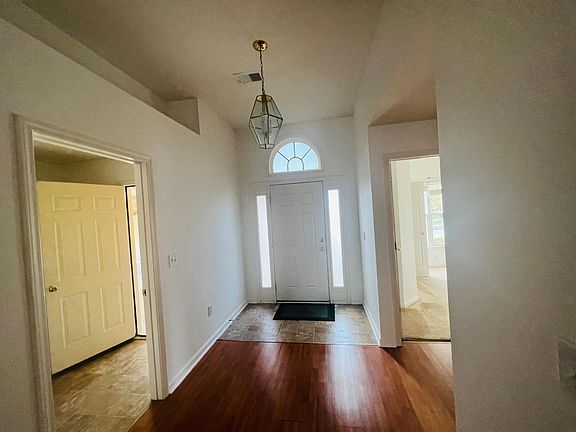 Front entrance with laundry room on the left side.
