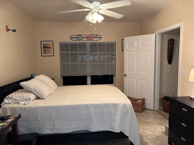Guest bedroom has a queen size bed. Large dresser and a desk with chair to work on the computer. The guest bathroom has a large sunken tub/ shower and a large walk-in closet as well! Filled with extra bedsheets and quilts for your comfort!