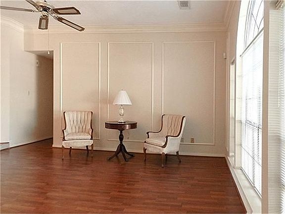 This living space features high ceilings.