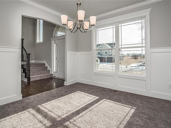 View from flex room to entrance and stairway