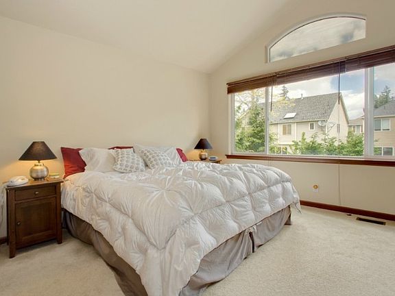 Luxurious Master Suite has vaulted ceilings, 5 piece bath with skylight & walk-in closet! Lots of natural light!