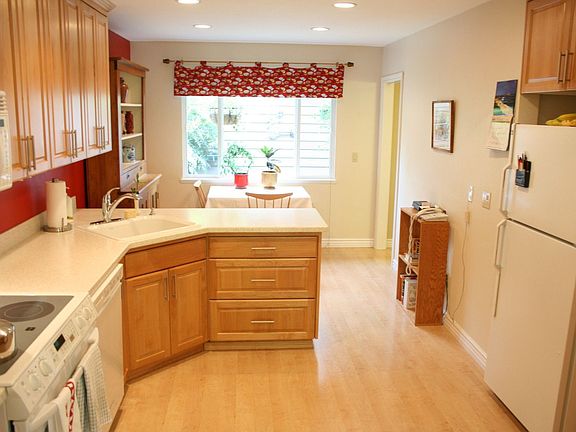 Efficiently designed kitchen with with ample storage and counter space 