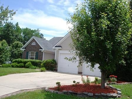 Ranch Surrounded by Mature Trees