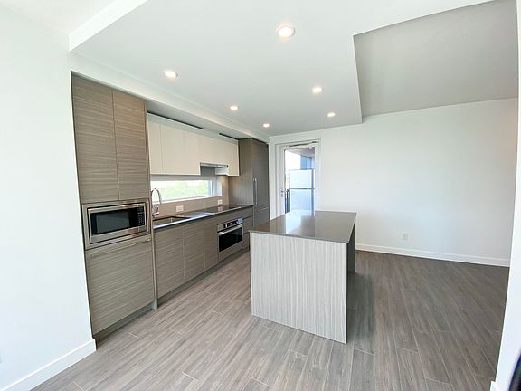 2nd image of 13615 Fraser Hwy #300