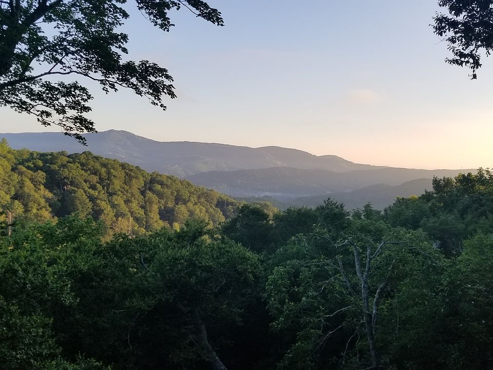 Beautiful mountain view from the private deck with a roof