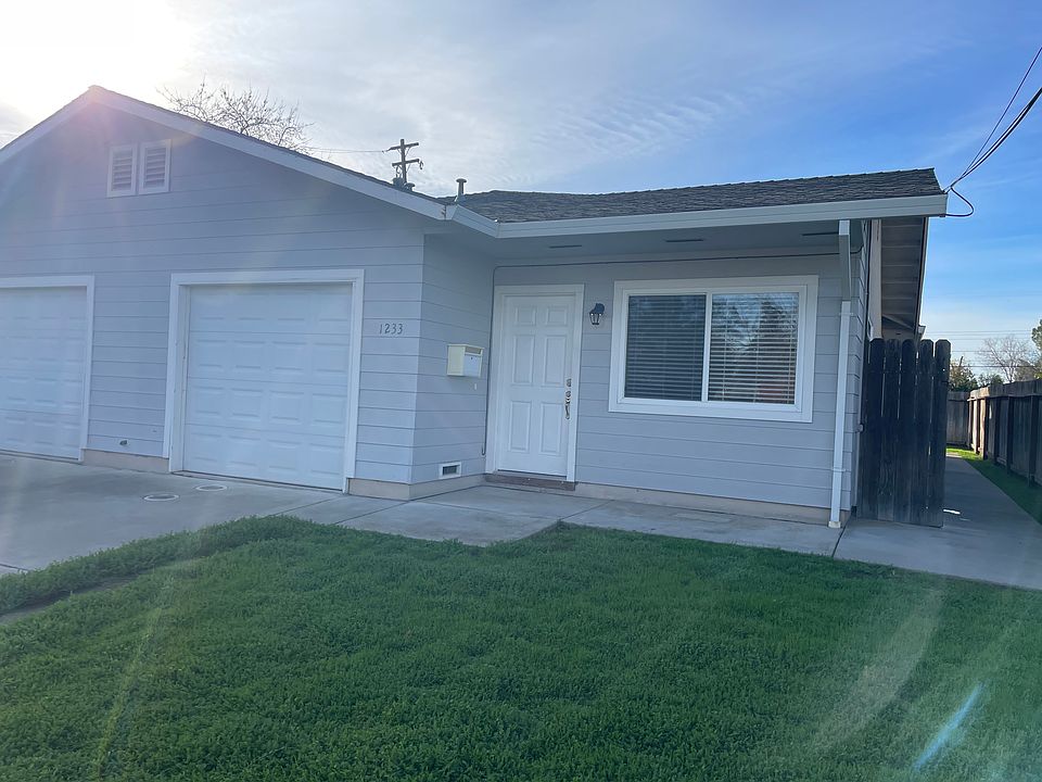 Welcome home! Attached garage and private yard.