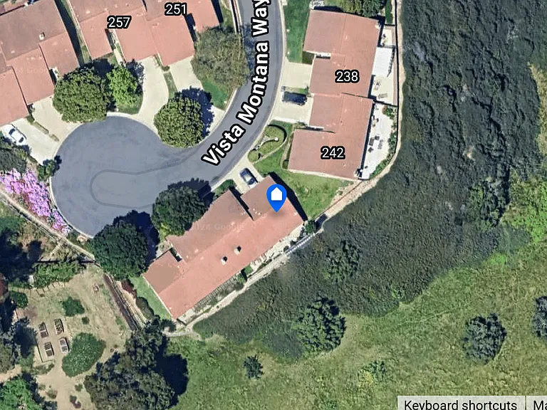as you can see that from the photo there is a large green area behind the checked house in the cul-de-sac. This is the home for rent.