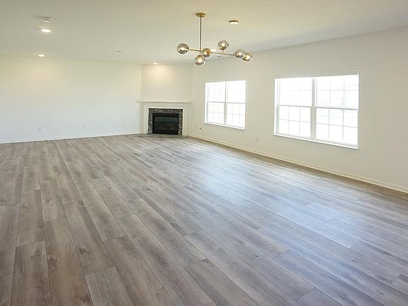 Family rm with fireplace.