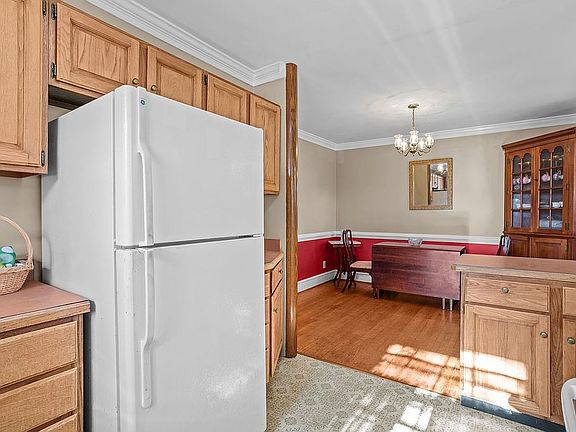 Kitchen opens to dining room
