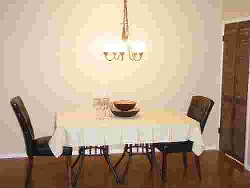 Formal dining w/ doors to kitchen