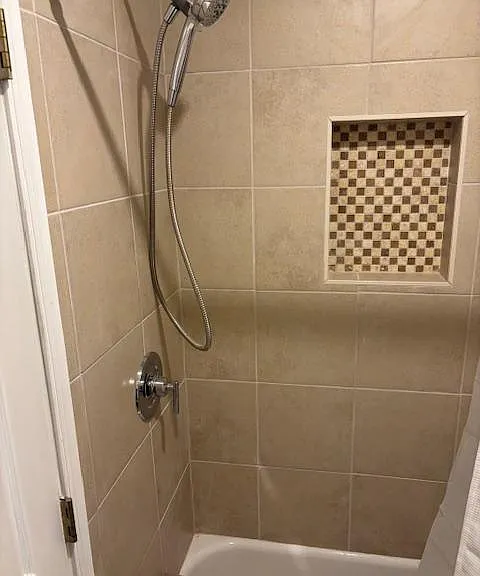 First floor bathtub with shower