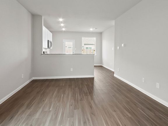 Family Room to Kitchen and Dining Area
