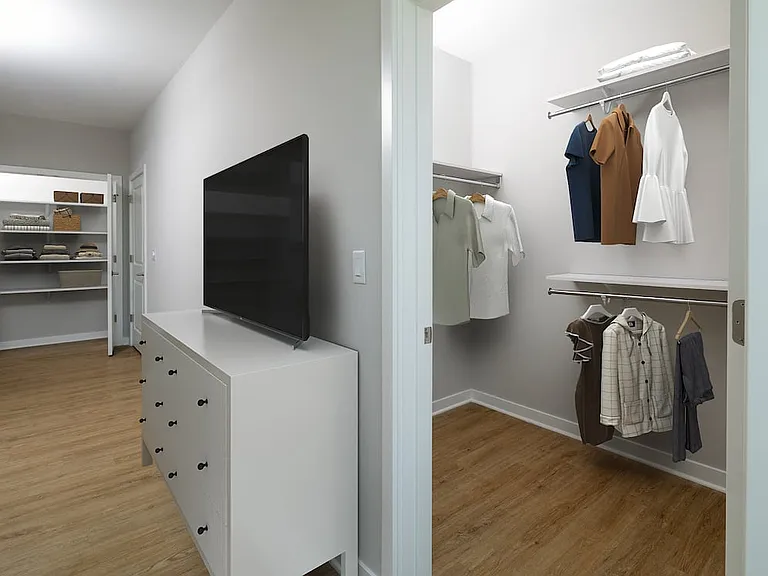 Signature Collection Bedroom with hard-surface vinyl plank flooring