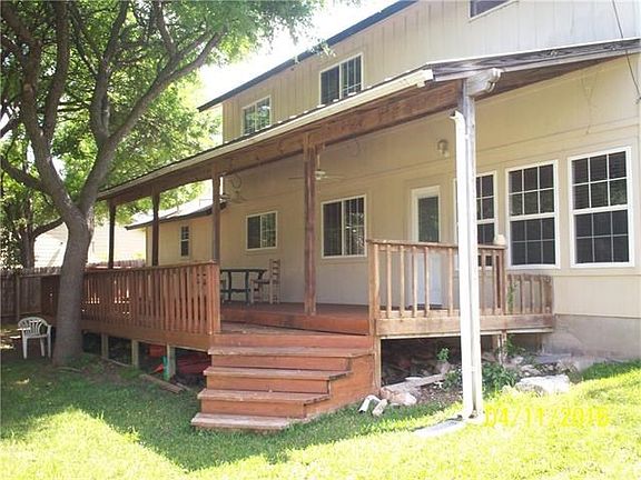 Another View of the Huge Metal-Roof-Covered Deck on the Back of the Home!  Note all the Energy Efficient Windows and Hardie Board Siding!