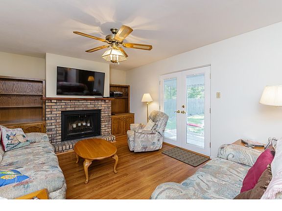 Family Room with wood burning fireplace and built ins