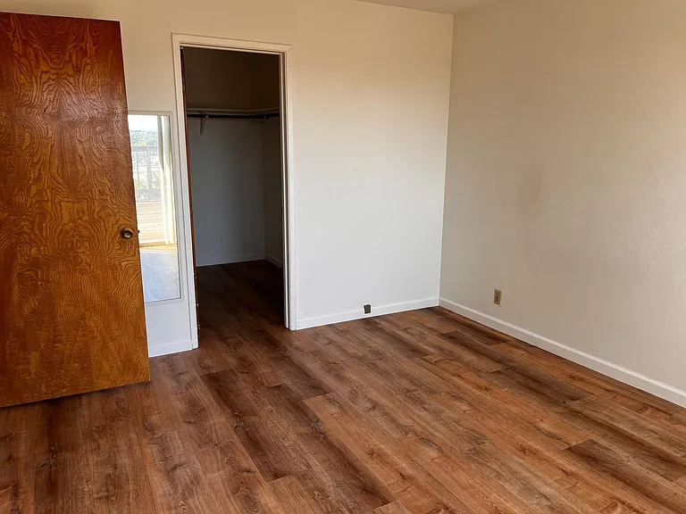 This bay-view bedroom also has a spacious walk-in closet.