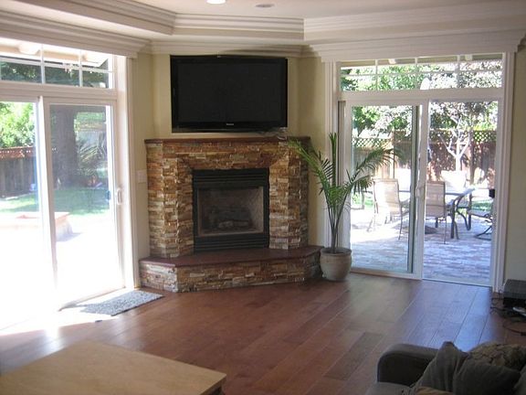 Step down family room with high ceilings, built-in speakers & access to yard