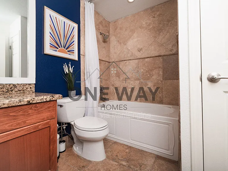 8702 E Sheridan St — Photo 10