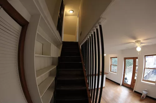 The stairway takes you to the three bedrooms. - 1417 Van Dyke St #3
