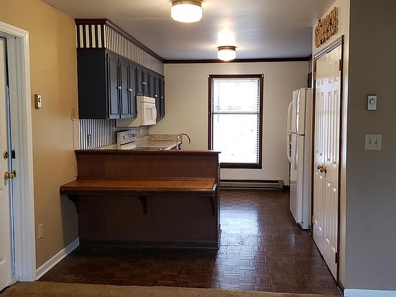 Living area view to kitchen
