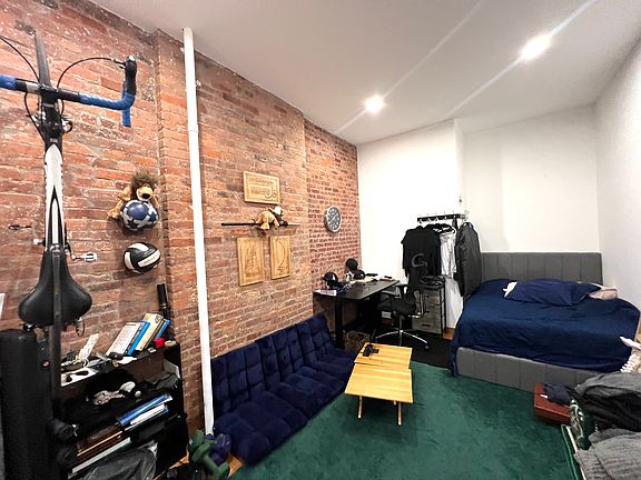 3rd image of 261 E 10th St APT 1C